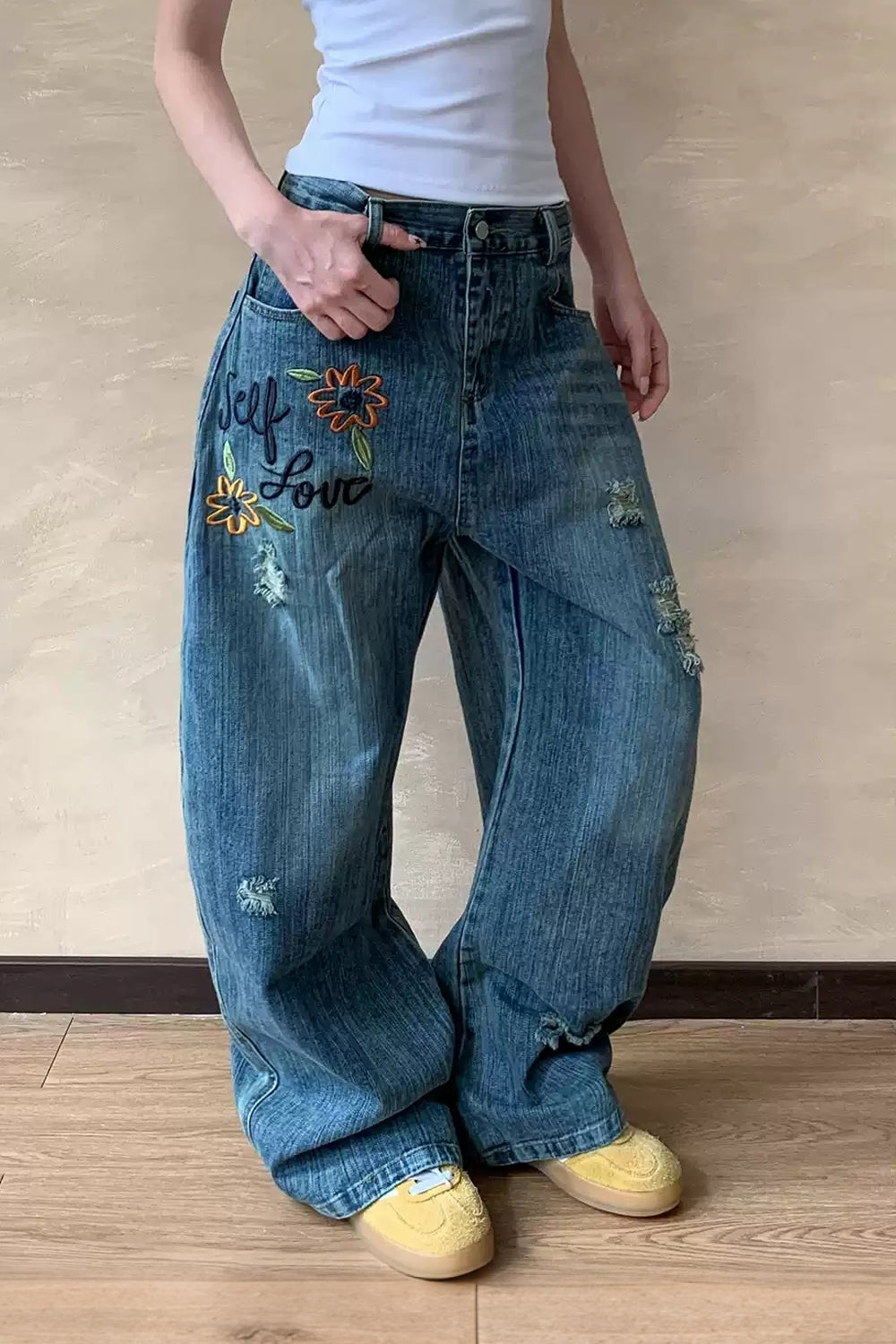 Embroidered Distressed Barrel Jeans