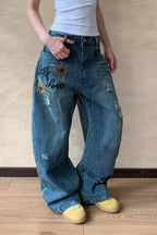 Embroidered Distressed Barrel Jeans
