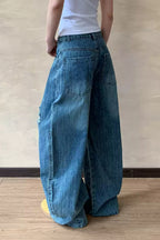 Embroidered Distressed Barrel Jeans