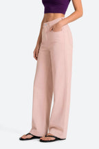 Women wearing pink wide leg stretch jeans