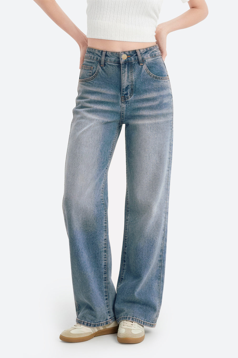 Women wearing retro blue wide leg stretch jeans