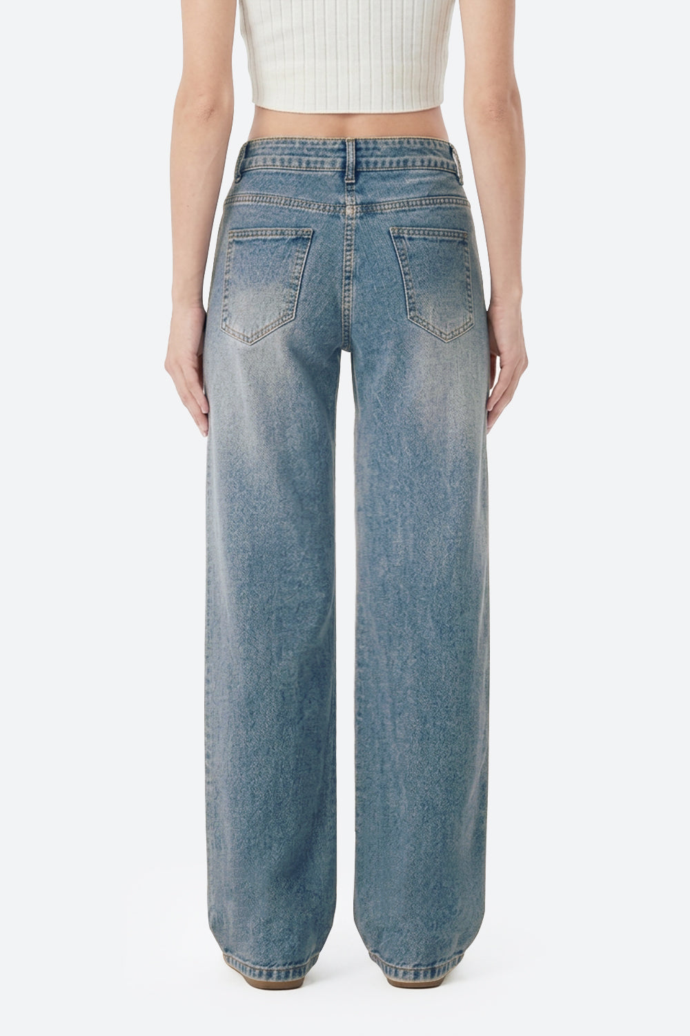 Women wearing retro blue wide leg stretch jeans