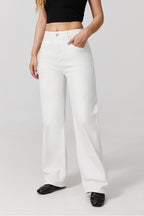 Women wearing white wide leg stretch jeans